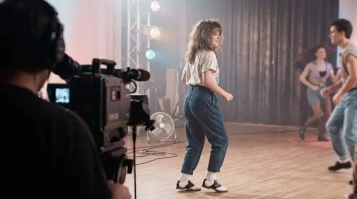Performer wearing saddle shoes on a 1980s music video set Performer wearing saddle shoes on a 1980s music video set
