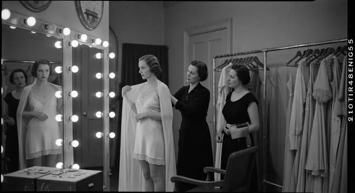 1930s Hollywood starlet in bias cut silk slip dress, marking transition from underwear to outerwear
