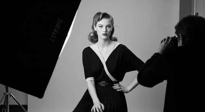 Young Lauren Bacall with deep side part hairstyle before fame